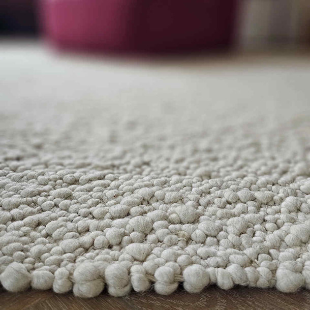 Grosses Detail Foto vom Rand Indoor Teppich Mona