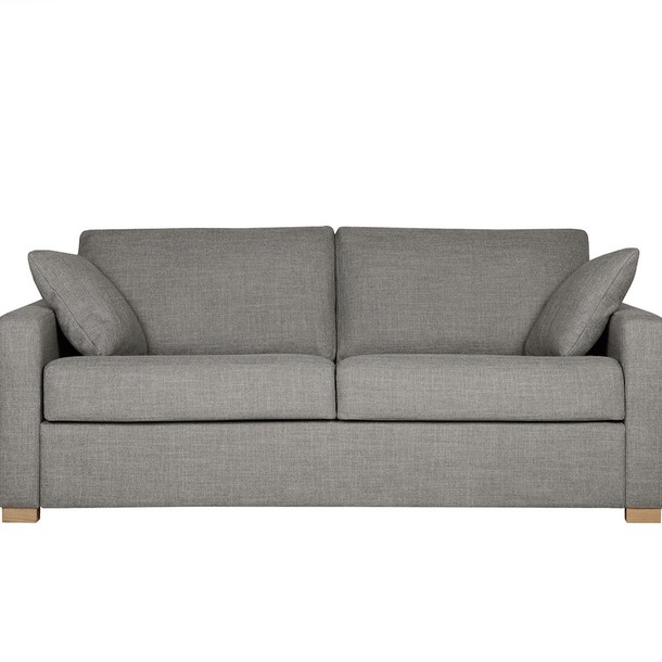 Seitenansicht des Schlafsofas Lukas in der Farbe Rose.
